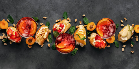 Summer drink with various fruit bruschetta dark background top view Delicious appetizers