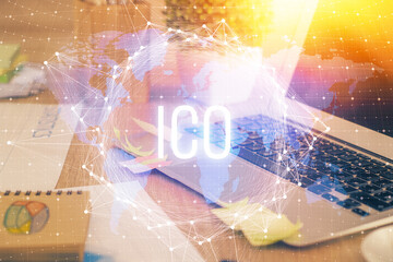 Multi exposure of blockchain theme hologram and table with computer background. Concept of bitcoin...