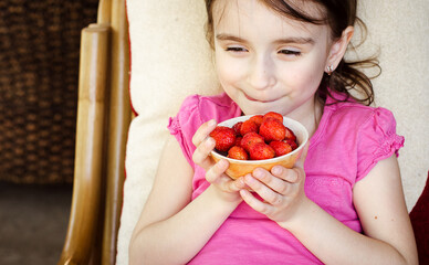 Girl with strawberry