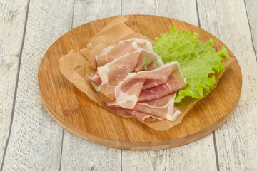 Italian prosciutto pork meat over board