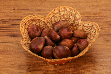 Fototapeta premium Chestnut heap in the bowl