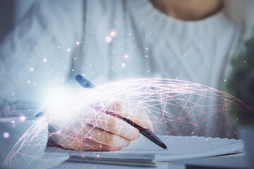 Social network theme hologram over woman's hands writing background. Concept of international people connect. Double exposure