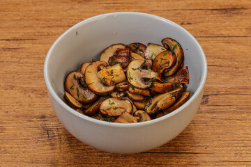 Roasted champignon with herbs and spices