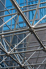 modern architecture, facade of the building is made of metal and glass