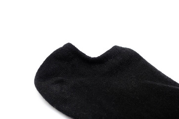 A pair of black unisex short socks on a white background. Black sports short socks in macro. Sweet socks