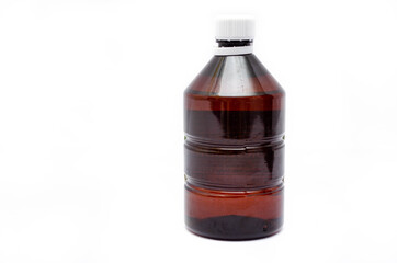 One bottle of cinnamon color plastic bubble on a white background with a white cap. Bubble with under antiseptic, hawthorn. Brown empty bottle with white cap in close-up