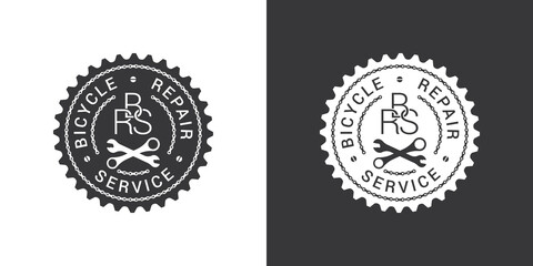 Bicycle repair service logo design with chain links, bike tools and text on chainring silhouette isolated on white and dark grey backgrounds.