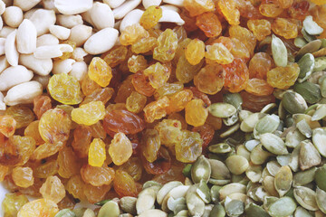 Raisins, peanuts, pumpkin seeds. Food.