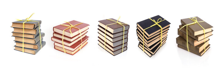 Set of stacks of books isolated on white background