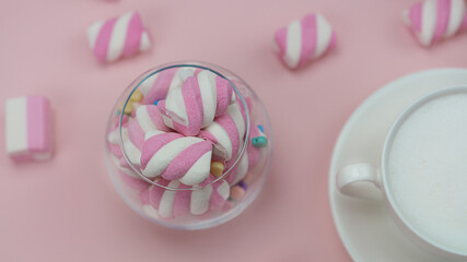 Obraz na płótnie Canvas Pink marshmallows with a delicious hot drink. Little girl's Breakfast. High quality photo.