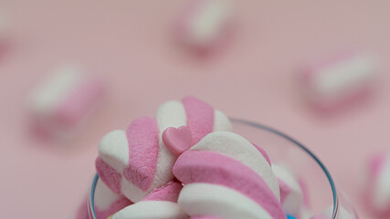 Pink marshmallows with a delicious hot drink. Little girl's Breakfast. High quality photo.