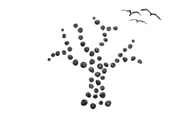 abstract tree with flying birds made of aluminum foil on a white background