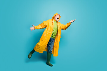 Full length body size view of his he nice cheerful positive grey-haired man wearing yellow topcoat...