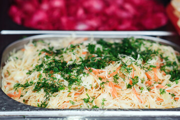 Fresh salad bar at street market displayed. Showcase with popular salads. Street food background.