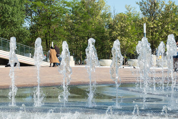 Fountain in the park. City fountain in the summer park.