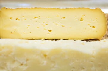 Dairy product. Fresh cheese on the table. Close-up - 358283780