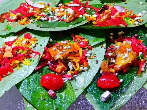 Banarasi Paan is a famous mouth freshener in specially  UP , Bihar  and  all over the India. Betel leaves are stuffed with Catechu, Pickling Lime, Areca Nut, Plain Tobacco and other things.