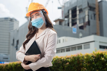 Engineers having wearing protective masks to prevent dust and covid 19