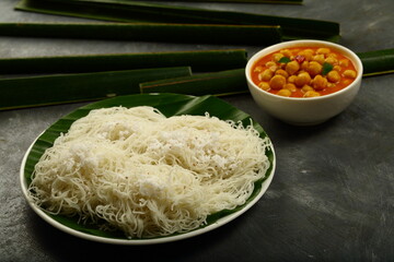 South Indian breakfast food- idi appam with vegetable curry