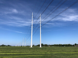 Fototapeta na wymiar Electricity poles around Etten