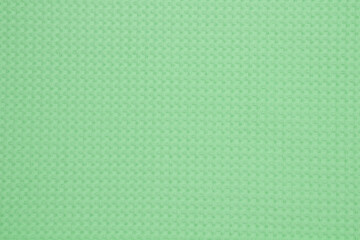 Fabric cotton fold, top view. Green textile