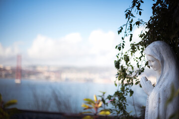 statue of the praying Virgin. The Virgin of Fatima.