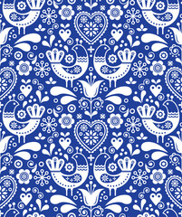 Scandinavian seamless folk art pattern with birds and flowers, Nordic floral design, retro background in white on navy blue 
