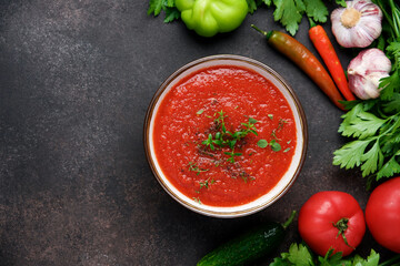 Tomato soup with herbs and spices. Mediterranean Kitchen. Traditional spanish gazapcho cold soup