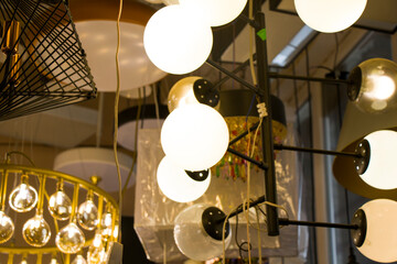 Fototapeta na wymiar Light bulbs and equipments shop, large group of light bulbs,