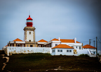 Fototapeta na wymiar large lighthouse by the ocean. beautiful lighthouse