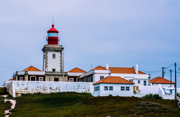 Fototapeta na wymiar large lighthouse by the ocean. beautiful lighthouse