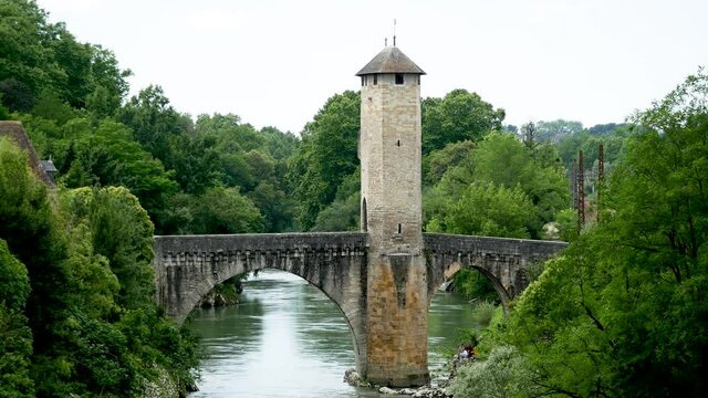 medieval bridge over river Gave de Pau in Orthez - France