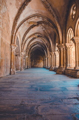 Fototapeta na wymiar large corridor with stone columns. Corridor in the monastery