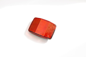 red reflective bicycle on white background