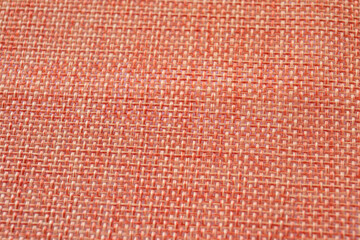 Fototapeta premium Orange textiles. Fabric for decoration, embroidery, backgrounds and creative works