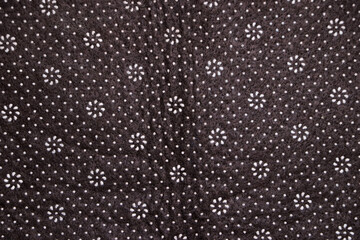 Floral round fabric pattern with dots brown color, nice pattern background 