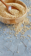 Raw dry white quinoa seeds close up
