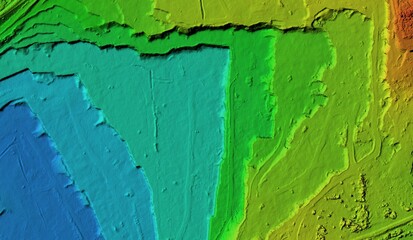 Fototapeta premium DEM - digital elevation model. Product made after proccesing pictures taken from a drone. It shows excavation site with steep rock walls 