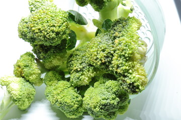 Fresh healthy broccoli isolated on white background