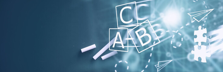 Chalkboard. Crayons for writing on a blackboard. Learning concept. School teaching chalk board.