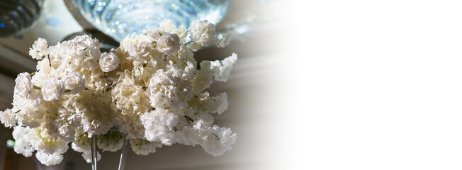 Wedding flower arrangements and decorations. Empty copyspace with white background and space for text. Holiday accessories and backgrounds
