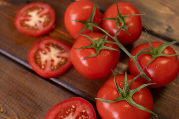 tomato on a brown wooden background, top view, text space, fresh vegetables