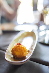 serving of balls round croquettes reyenas goat cheese
