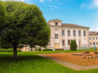 Residential buildings surrounded by greenery on a Sunny summer day