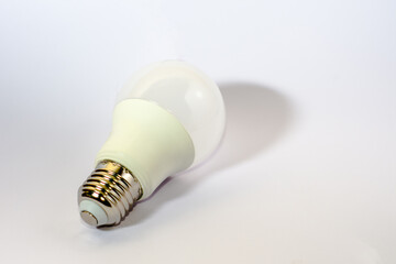 Modern LED light bulb on white background.