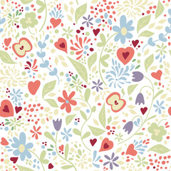 floral pattern with camomile, clover, bluebell and different plants. good for textile, prints, wraps