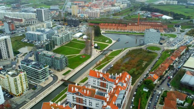 Buildings and canal in Aveiro , beautiful village named the Venice of Portugal