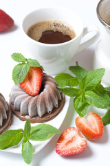 Chocolate fudge garnished with half a strawberry with petals. Garnished with sprigs of mint and...