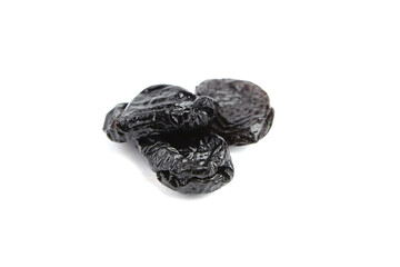 Prunes, dry plums isolated on white background. Heap of dried fruits