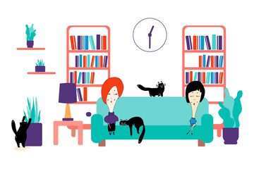 The concept of staying at home.The girl is sitting on the sofa with a friend at a distance. A cat lies between them. Cozy modern Scandinavian interior.Own isolation, quarantine